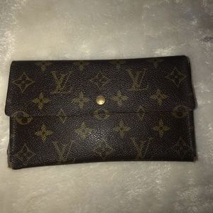 A vintage Louis Vuitton wallet